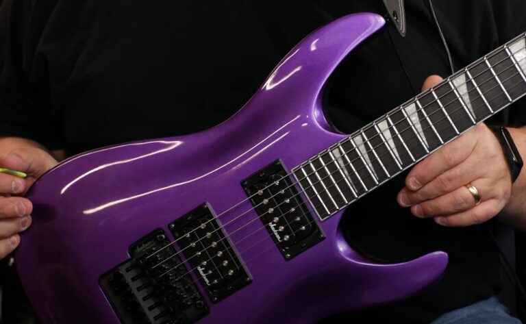 Photo of a purple Floyd Rose guitar