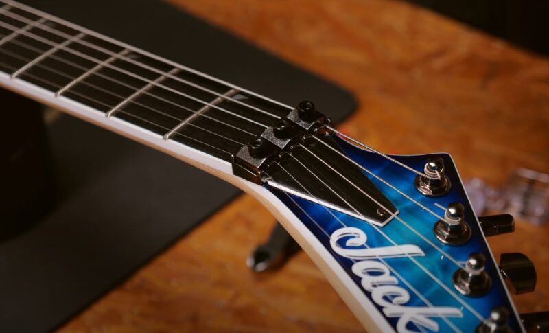 close-up view of the neck and headstock of an electric guitar