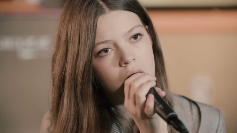 Courtney Hadwin Performing While Holding a Microphone