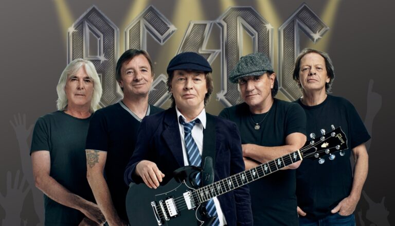 A group photo of the band AC/DC with their iconic logo in the background