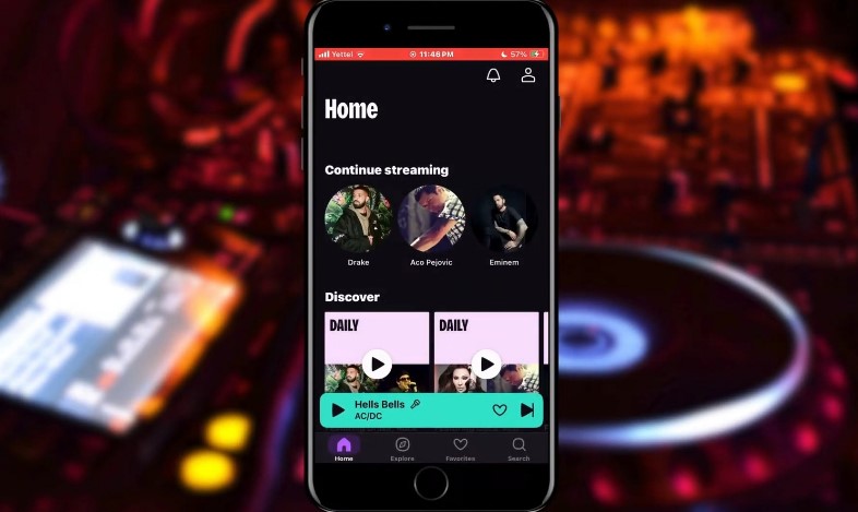 Deezer music app interface, showcasing various artists and playlists