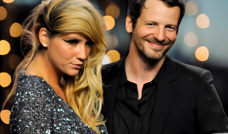 Kesha and Dr. Luke posing for a picture