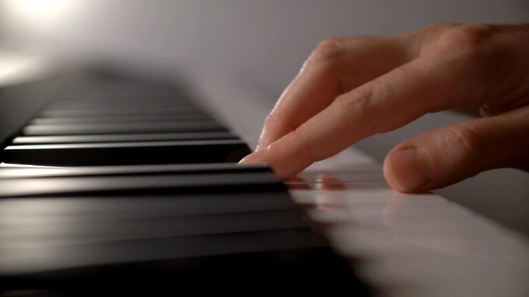 A close-up of fingers playing piano keys shows focused practice with musical instruments
