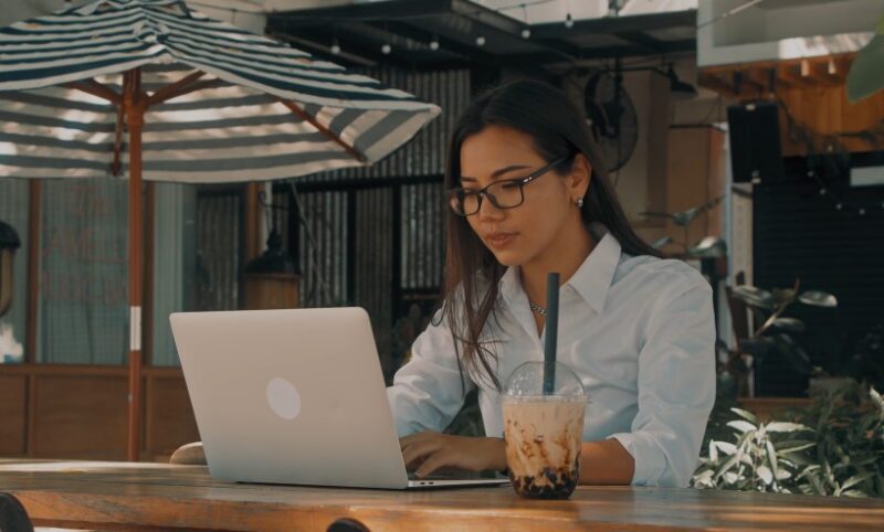 A woman working diligently on her laptop
