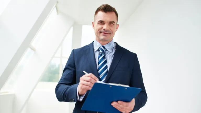 A celebrity manager reviewing schedules and managing tasks in a professional setting