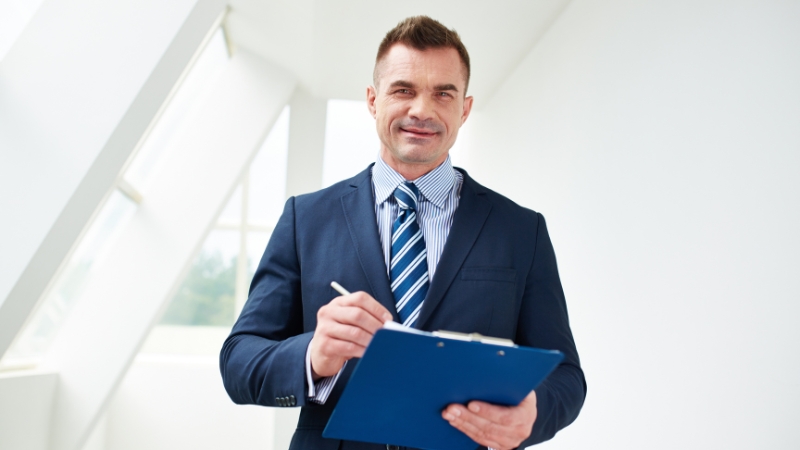 A celebrity manager reviewing schedules and managing tasks in a professional setting